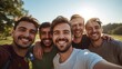 © usama - Happy Group of Male Friends Taking Selfie Outdoors in Nature During Golden Hour