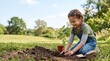 © Lena - Young girl planting a small tree in the garden under blue sky