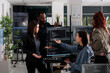 © DC Studio - Multi ethnic web developers writing script while talking about develop cloud computing server. IT engineers having unexpected server error and no access to database, hacking attack.