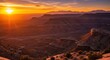 © Anita - Spectacular Golden Sunset Illuminates Arid Mountain Desert Landscape with Distant Peaks