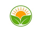 Circular logo, green leaves and a sun