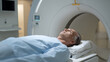 © photo for everything - Older adult patient lie on table preparing for medical scan procedure in hospital clinic, diagnostic test for patient condition, health checkup