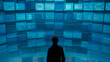 © ADDICTIVE STOCK - Silhouette of man observing multiple digital screens with graphics