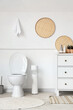 © Pixel-Shot - Interior of modern bathroom with ceramic toilet bowl