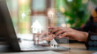 © chaylek - real estate agent reviews digital home listings laptop, comparing property details through online platforms, representing smart housing search, property technology, digital real estate services