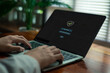 © loechai - user entering a secure password on a laptop login screen, representing cybersecurity, data protection, user authentication, privacy, and safe digital access in a modern technology environment.