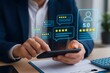 © Image Alchemy - Businessman interacts with his smartphone, reviewing virtual customer feedback and 5-star rating icons hovering above the device, indicating satisfaction.