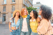 © Renata Hamuda - Multicultural best girl friends having fun hanging out together on city street