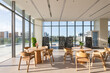 © zhu difeng - Modern office lounge with wooden round tables and chairs bathed in natural sunlight through floor-to-ceiling windows