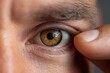 © Prazis Images - Doctor Examining a Patient's Eye During a Medical Check-up