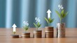 © Sultana - Green leaf plant growing on increasing coin stacking with up arrow for money saving deposit and investment dividend growth concept..