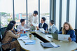 © Thinapob - Successful happy workers Group of business people with Multiethnic workers with in company workers Group of asian business people and support Teamwork in the meeting room at modern office.
