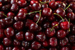 © Viktoriia Kolosova - Full frame close-up of ripe dark red cherries texture