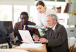 © JackF - Teamwork in the office to launch a new project. Accountants, managers, and advertising work together
