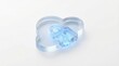 © Anas - A delicate blue heart-shaped crystal nestled in a clear glass heart