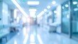 © Hety - Blurred bright hospital corridor with medical facility interior, showing a clean and sterile environment.