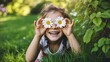 © Izhar_45068 - Happy Child Holding Daisy Flowers Over Eyes  Joy Nature and Summer Fun