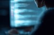 © Firadoaw - student studying cybersecurity and coding on computer screen with digital code interface, technology education concept