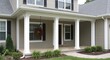 © AImmersive Imagery - New residential house entrance porch with white rectangular pillars and extended roof section finished with vinyl siding