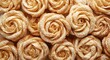 © vxnaghiyev - Gourmet puff pastry roses finely dusted with icing sugar for a charming dessert display