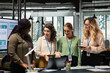 © DC Studio - Career focused businesswomen reviewing analytics and aligning objectives, empowered by data and driven by vision. Strategizing performance improvements through teamwork and collaboration.