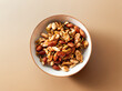 © mnimage - Almonds, walnuts, and nuts on a plate