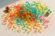 © Aleksandra - Party streamer rolls spread colorful curled decoration with confetti on table