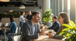 © Lucianastudio - Diverse colleagues in a modern office cafe enjoying a coffee break and engaging in friendly conversation during a workday