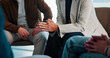 © peopleimages.com - Stress, hands and woman with talking in group therapy for healing, mental health or grief support. Psychology, person with depression and share trauma in counseling for rehabilitation, loss or advice