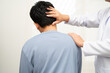 © amazing studio - Physical therapy, Asian therapist doctor treat perform pain young man in hospital.