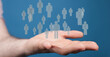 © vegefox.com - Concept of community, global connections, and support represented by floating human figures above a hand. Ideal for ill