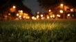 © Thares2020 - Low angle view of lush green grass at night with blurred vibrant city lights creating a bokeh effect in the background