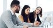 © peopleimages.com - Meeting, team and business people on laptop for finance review, investment proposal and feedback. Corporate, boardroom and workers in discussion for financial report, budget and research on computer