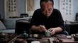 © Natsumae - Dedicated traditional craftsman working with dedication in authentic cultural setting