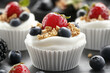© Poj - Healthy yogurt cupcakes with granola and fresh berries