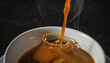 © Andre - Close-up dynamic shot of hot coffee being poured into a white mug, creating a splash and steam rising