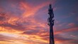 © VolumeThings - Advanced 5G tower silhouetted by a stunning sunset