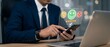 © dgpatel - Businessman in a blue suit carefully evaluates customer experience by tapping on a smartphone screen showing a positive five-star rating and happy emoji feedback.