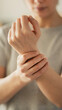 © sebra - Young woman with wrist pain