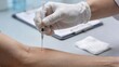 © Rajesh - Medical injection on arm