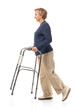 © Pixel-Shot - Mature woman using walking frame on white background