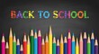 © kagraphixion - Vibrant back to school illustration with colorful pencils and chalkboard