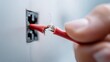© touseef - Close-up of damaged electrical cable on electronic device with finger pointing at exposed wires, highlighting safety hazard, risk of electric shock, faulty wiring, home appliance danger, maintenance a