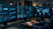 © solom - professional security analyst working at triple monitor workstation with global monitoring map network traffic data charts and computer code for cyber security operation center