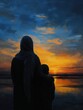 © pisan thailand - A person in a headscarf embraces a child, both silhouetted against a vivid sunset over calm water, evoking warmth and contemplation.