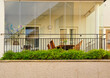 © a40757se - Glass covered balcony with a lounge set