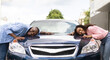 © Prostock-studio - Happy Car Buyers, New Owners Concept. Portrait Of Excited Young African American Couple Touching Hugging New Luxury Automobile After Purchase In Dealership Showroom Standing Outdoors. Dreams Come True