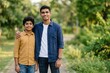 © smit - Indian Brothers Standing Together Outdoors – Supportive Sibling Bond Lifestyle
