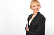 © SHOTPRIME STUDIO - Confident middle aged woman in black blazer holding laptop, standing against white background. Concept for business, technology, and professional lifestyle.