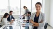 © SHAPLA - Professional woman leading a team meeting in a modern office setting